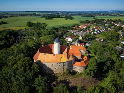 Schönfels Castle with the newly renovated keep (castle tower) . Schönfels Castle is a typical