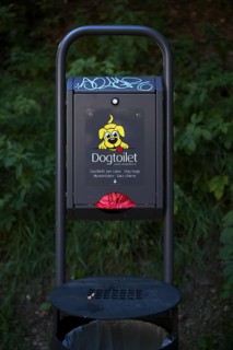 Dog excrement bag dispenser, Ortisei, Val Gardena, Trentino, South Tyrol, Italy, Europe