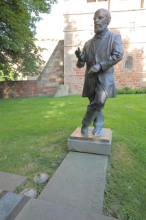 Konrad Duden with inscription on the Duden Zuse monument, statue, personality, Bad Hersfeld, Hesse,