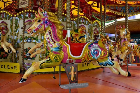 Colourful painted horse in a carousel, London, England, United Kingdom, Europe