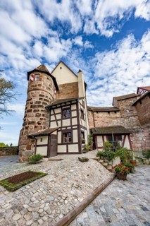 Tower and half-timbered house, Burgamtmannsgebäude der Burggrafenburg, Kaiserburg, in autumn,