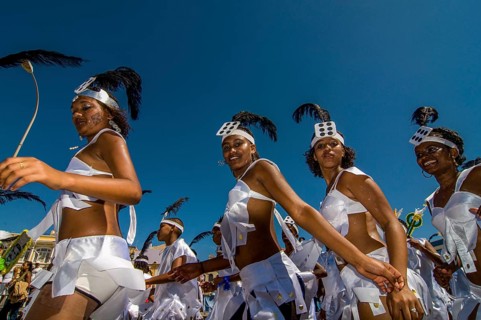 Colourful costumed, pretty women are dancing. Carnival. Mindelo. Cabo Verde. Africa