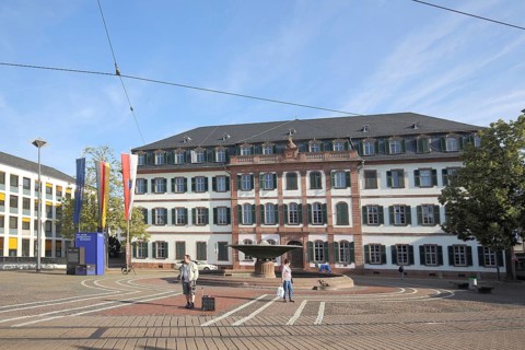 Regional Council, collegiate building built 1777 -1780 with state flag, EU flag, national flag,