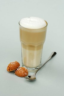 Slat macchiato, spoons and biscuits, biscuits, cookies, glass