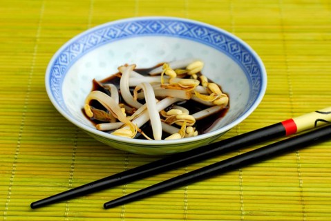 Bowl with bean sprouts, soy sauce and chopsticks, soy sprouts, soy sauce, sauce