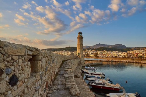 Morning light, sunrise, Venetian harbour, harbour wall, Venetian lighthouse, boats, blue sky, few