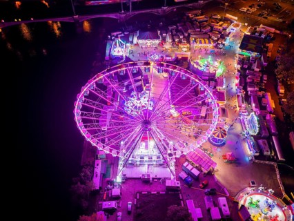 A 55m high illuminated Ferris wheel is the landmark of the fair at the Volksfest grounds on