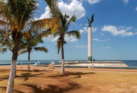 Sculpture of winged Mayan Angel on tall column, the seafront Malecon, Campeche city, Campeche