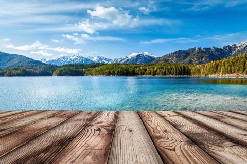Wooden planks European nature background with lake in Alps, Germany, Europe