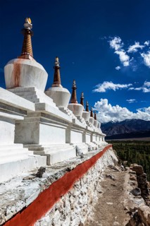 Chortens (Buddhist stupas) outside the Shey palace, Ladakh, India, Asia