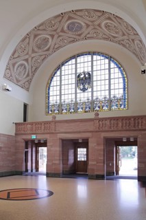 Foyer of the Neo-Renaissance railway station, interior view, glass window, imperial eagle, Bad