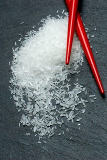 Crystalline glutamate with chopsticks, flavour enhancer