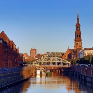 Customs canal with the ship of the customs museum of the Kornhausbrücke and the main church St.