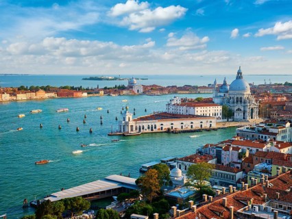 View of Venice lagoon and Santa Maria della Salute church on summer day. Venice, Italy, Europe