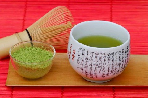 Japanese Matcha tea, 'Chasen' bamboo broom, bowl with green tea powder, green tea, green tea