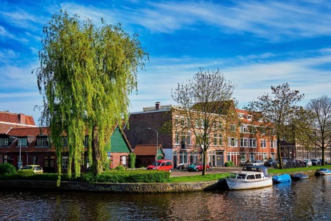 Boats and houses and canal. Harlem, Netherlands