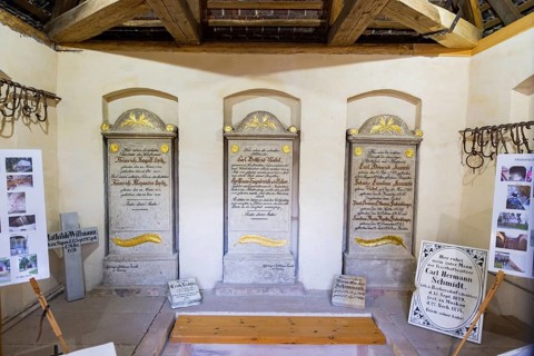 Crypt house with recovered grave slabs at the cemetery in Bad Muskau