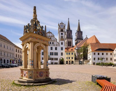 Oschatz market square with Renaissance fountain from 1578, Rathaius and St. Aegidien Church