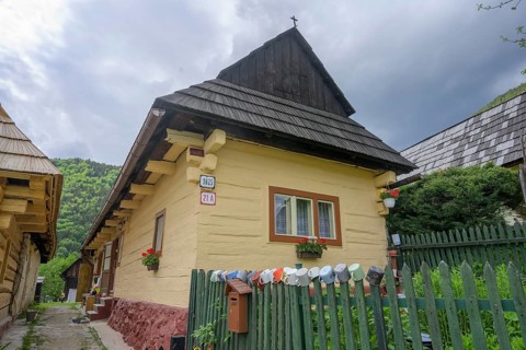Colourfully painted wooden houses in the village of Vlkolinec, Unesco World Heritage Site,
