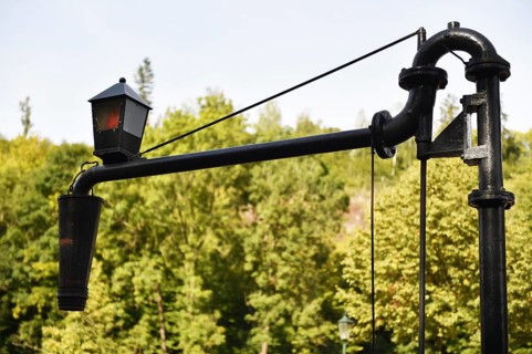 Water crane for steam locomotives of the Harz narrow gauge railway in the Harz Mountains, Germany,