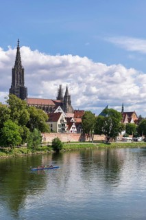 City view, Danube bank with historic old town, fishermen's quarter, cathedral, rowing boat, sports