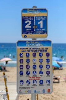 Sign with corona rules on the beach Playa Levante, Benidorm, Alicante province, Costa Blanca,