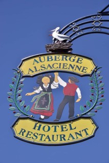 Hanging sign on an Alsatian restaurant, Eguisheim, Département Haut-Rhin, Alsace, France, Europe