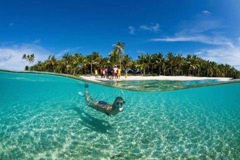 Snorkelling off Palm Island, Fadol, Kai Islands, Moluccas, Indonesia, Asia