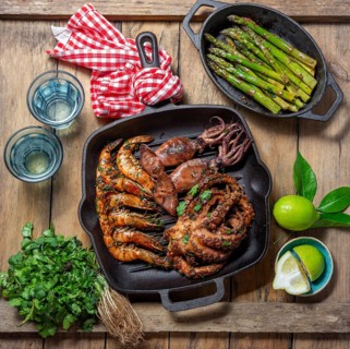 Food, Grilled spimps, squids and octopus in cast iron grill pan