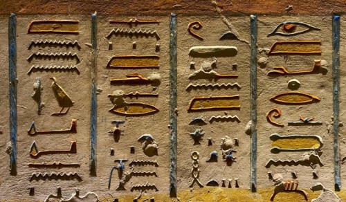 Ancient color egypt images and hieroglyphics on wall