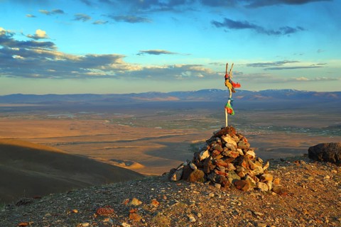 Landscape with sacred pass in Altai mountains at sunset