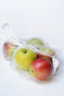 Apple in plastic bag, packaging