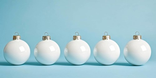 White Christmas tree baubles in a row on pastel blue background. Generative AI, AI generated
