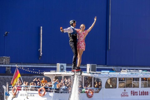 Harbour festival in Stuttgart. Spectacular jet ski and flyboard show on the Neckar. Stuttgart,