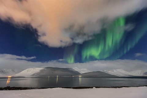 Northern Lights over fjord landscape, Aurora borealis, snow, winter, mountains, Thingeyri,