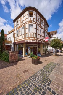 Toy shop in a rounded half-timbered house in Braunstraße in Michelstadt, Odenwald, Odenwaldkreis,