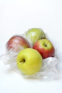 Apple in plastic bag, packaging
