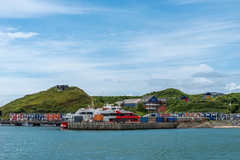 View from the Binnenreede to the inland harbour with the high-speed catamaran Halunder Jet,