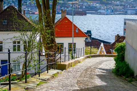 Bergen, Norway, May 2015: Cozy cobblestoned street in the historical center of Bergen, Norway,