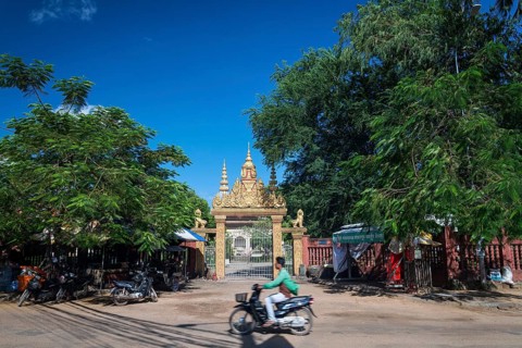 Wat damnak temple door and street in central urban siem reap city cambodia