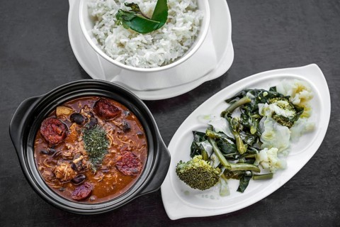 Chicken feijoada with chorizo portuguese rustic spicy traditional bean stew meal