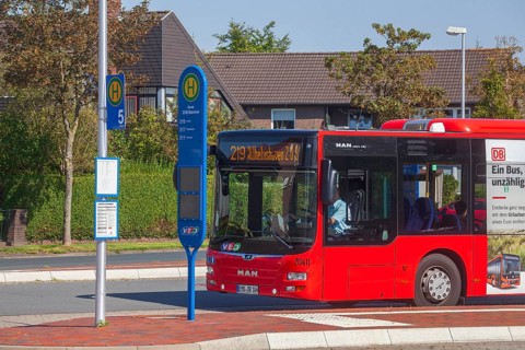 Bus stop with bus, Jever, Lower Saxony, Germany, Europe