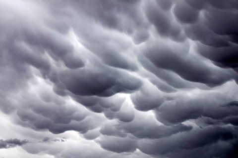 Formation of Mammatus clouds dramatic sky background