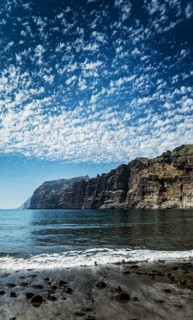 Los gigantes cliffs natural famous landmark and volcanic black sand beach in south tenerife island