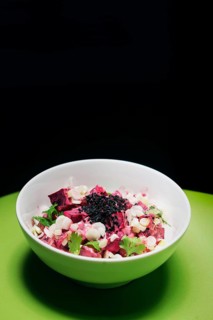Healthy fresh beetroot sour cream and spring onion salad