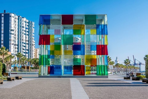 Malaga, Spain, April 2023: View on the Centre Pompidou colorful cube architecture by Daniel Buren.
