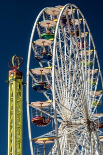 Bergen, Norway, May 2014: close-up and detail of colorful ferris wheel on blue sky, Europe