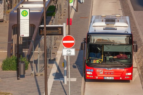 Bus stop with bus, Achim, Lower Saxony, Germany, Europe