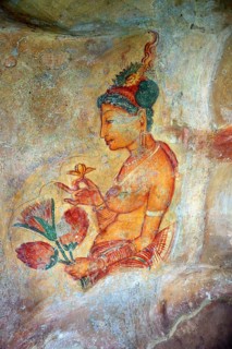 SIGIRIYA, SRI LANKA, MARCH 20, 2015: Sigiriya maiden, 5th century frescoes at the ancient rock