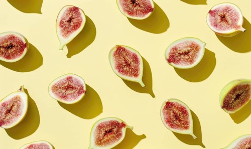 Figs on a pale yellow background AI generated